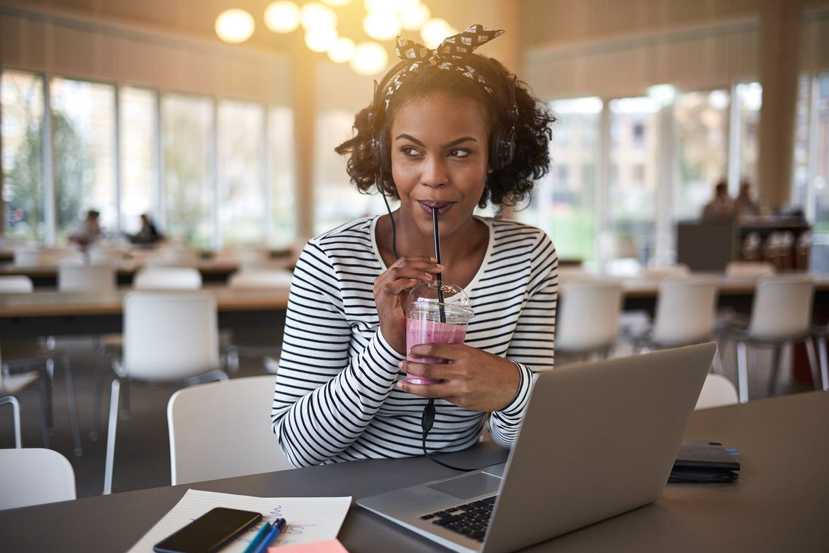 A woman drinks a supplement smoothie. Wondering which supplements help bruising after breast augmentation? See what supports healing, what has limited evidence and what to ask your surgeon first.