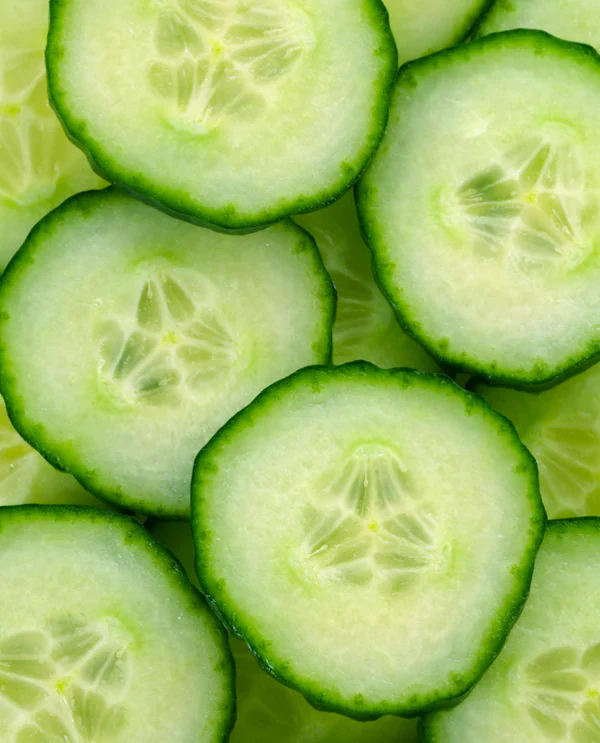 A detail photo of cucumbers. Before + After Vitals surgery recovery supplements contain proprietary amino acids, including amino acids that are vital for tissue repair.