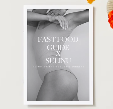 Black and white photo of a woman in a bodysuit, arm raised and partially covering her face. Overlaid text: FAST FOOD Guide – How to Eat Fast Food Without Ruining Your Results (Download).