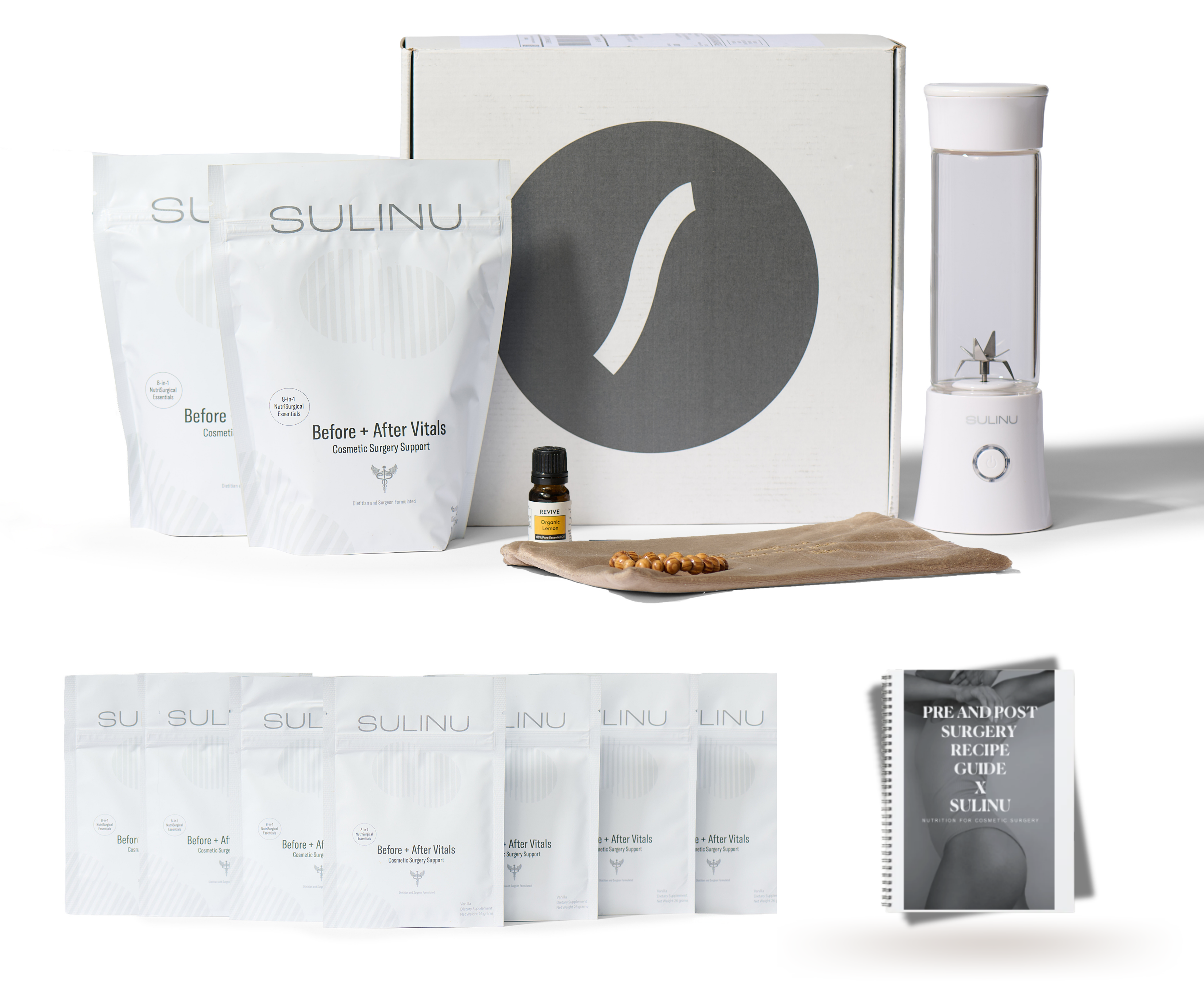 A collection of The VIP Surgical Recovery Kit by Sulinu, featuring wellness essentials for cosmetic surgery recovery: packets, a white box labeled “The VIP Surgical Recovery Kit,” a blender, a recipe booklet, a small bottle of surgery supplements, and a beige towel with almonds—all thoughtfully arranged on a white background.